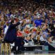 Illustration for article titled Eight Photos Of Coach K Sitting On A Lil Stool